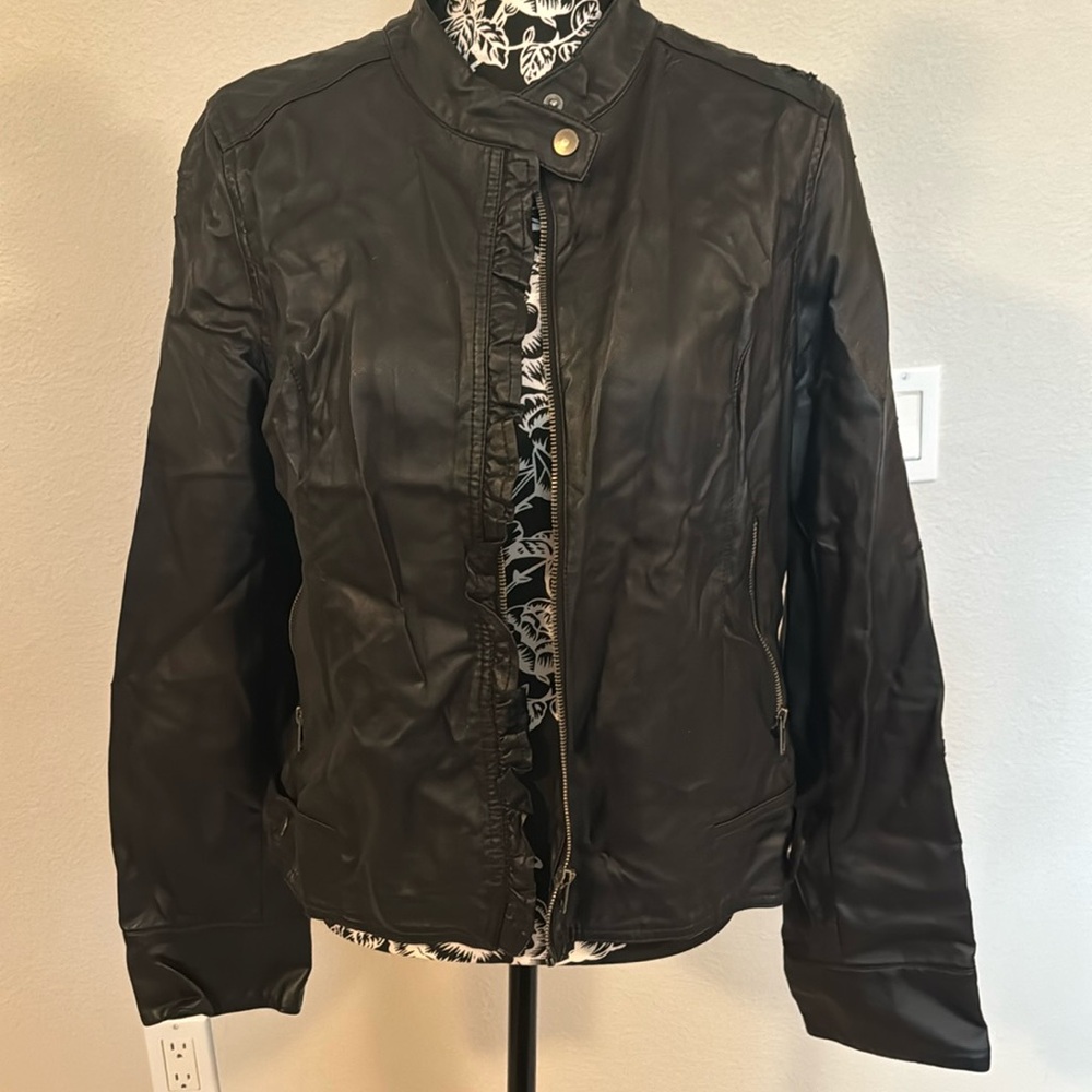 Woman’s black jacket
